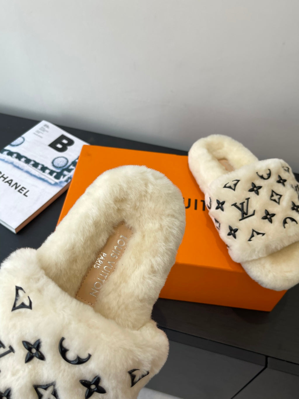 Louis Vuitton plush fur slide slippers, cream upper with black monogram icons