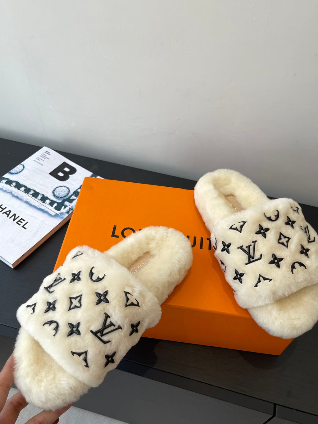 Louis Vuitton plush fur slides with black monogram print, open toe and wide band