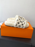 Louis Vuitton plush fur slide sandals, cream with black monogram allover print