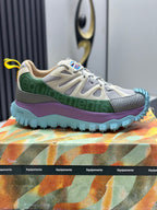 Moncler lace-up trail sneakers, beige upper with green paneling, purple midsole, blue tread