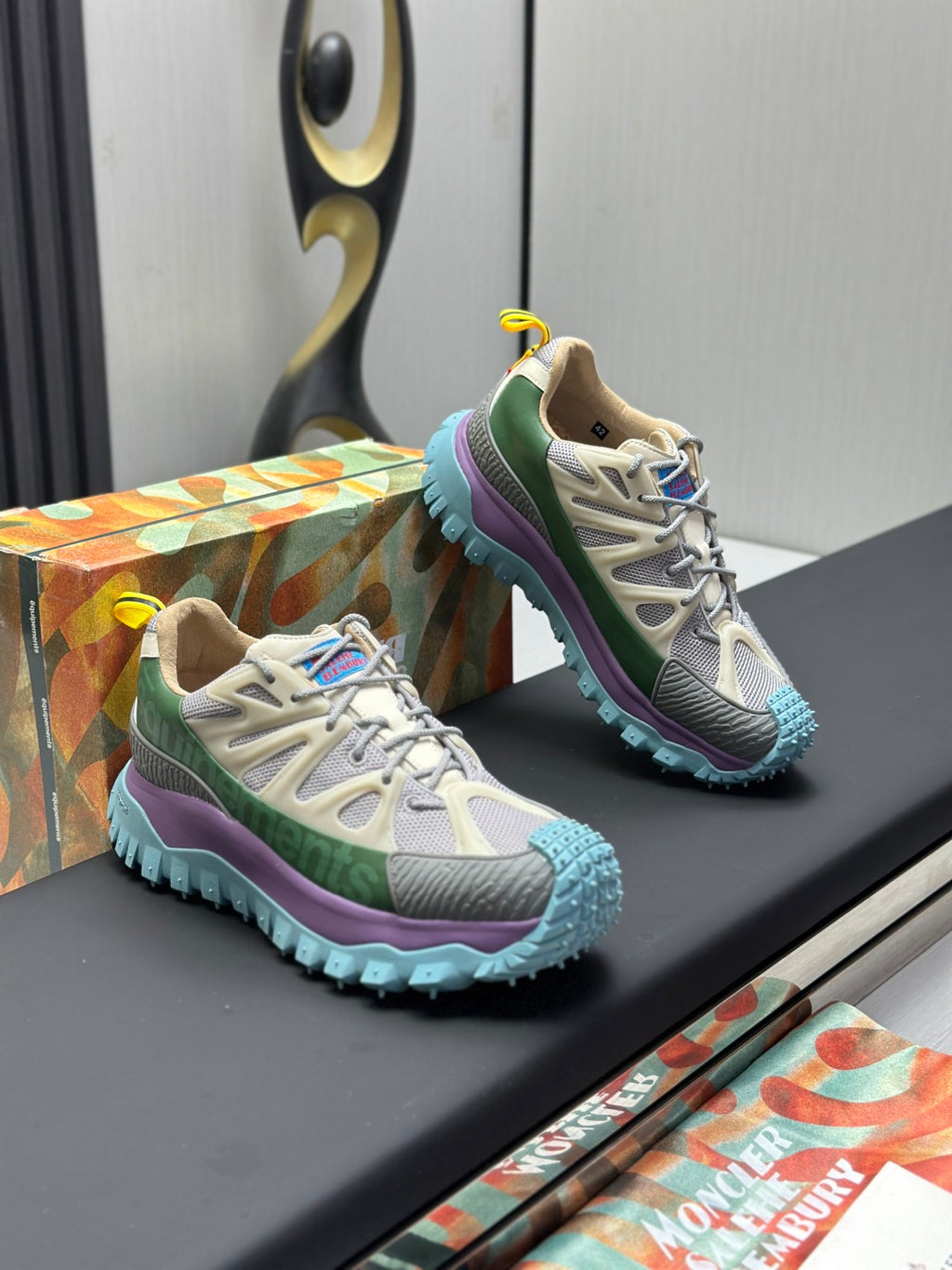 Moncler lace-up trail sneakers, beige mesh with green and purple panels, blue chunky sole