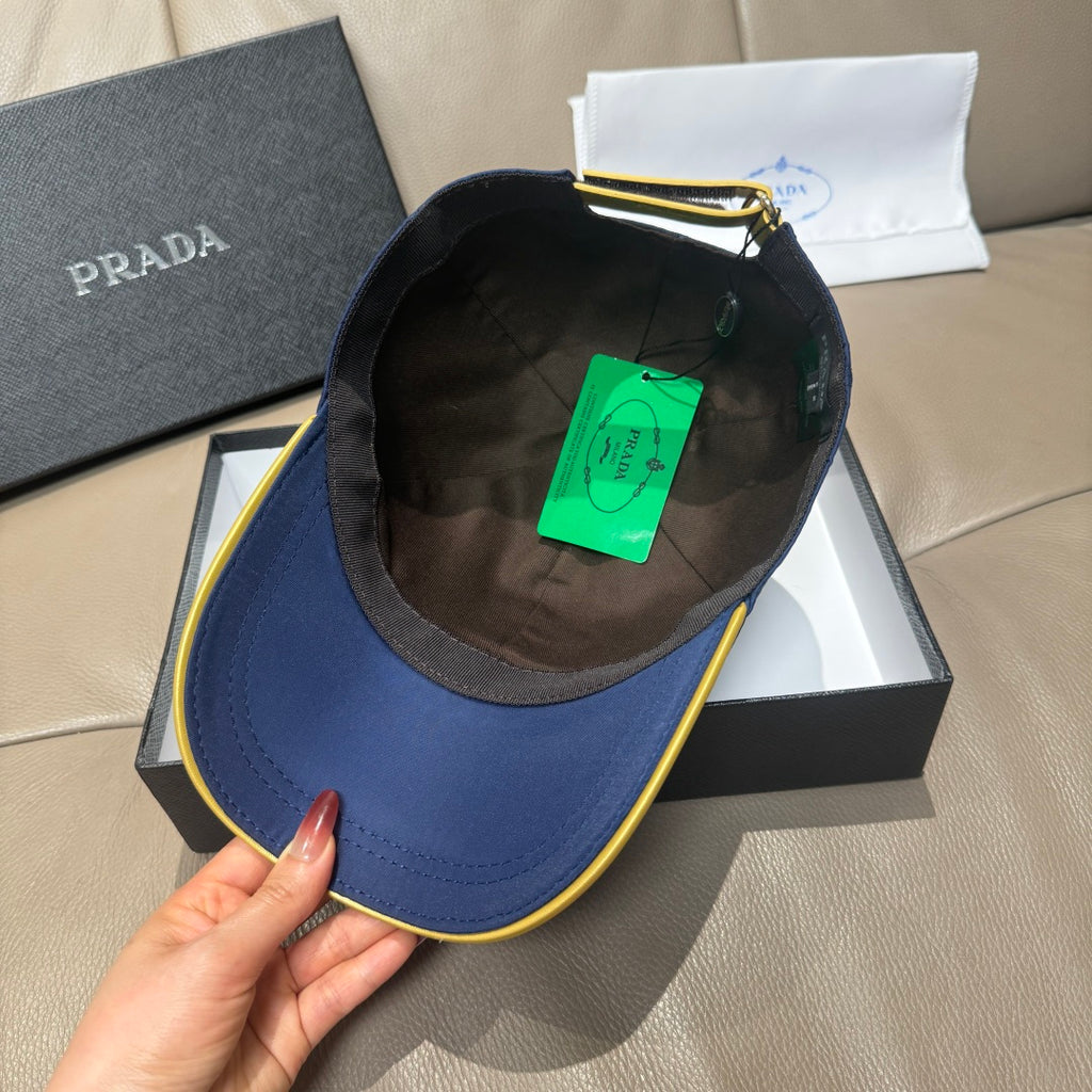 Prada cap interior view with dark lining and green tag on the crown.