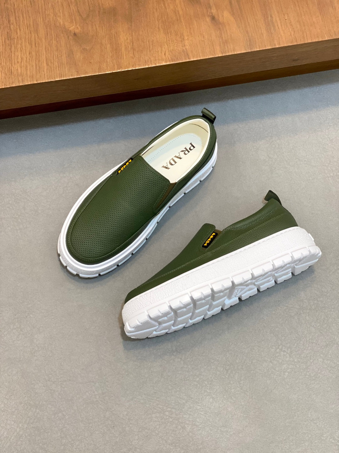 Prada unisex slip-on shoes, green upper with white outsole and insole logo
