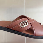 Gucci pink leather slide sandal upper with silver GG buckle and crossing strap.