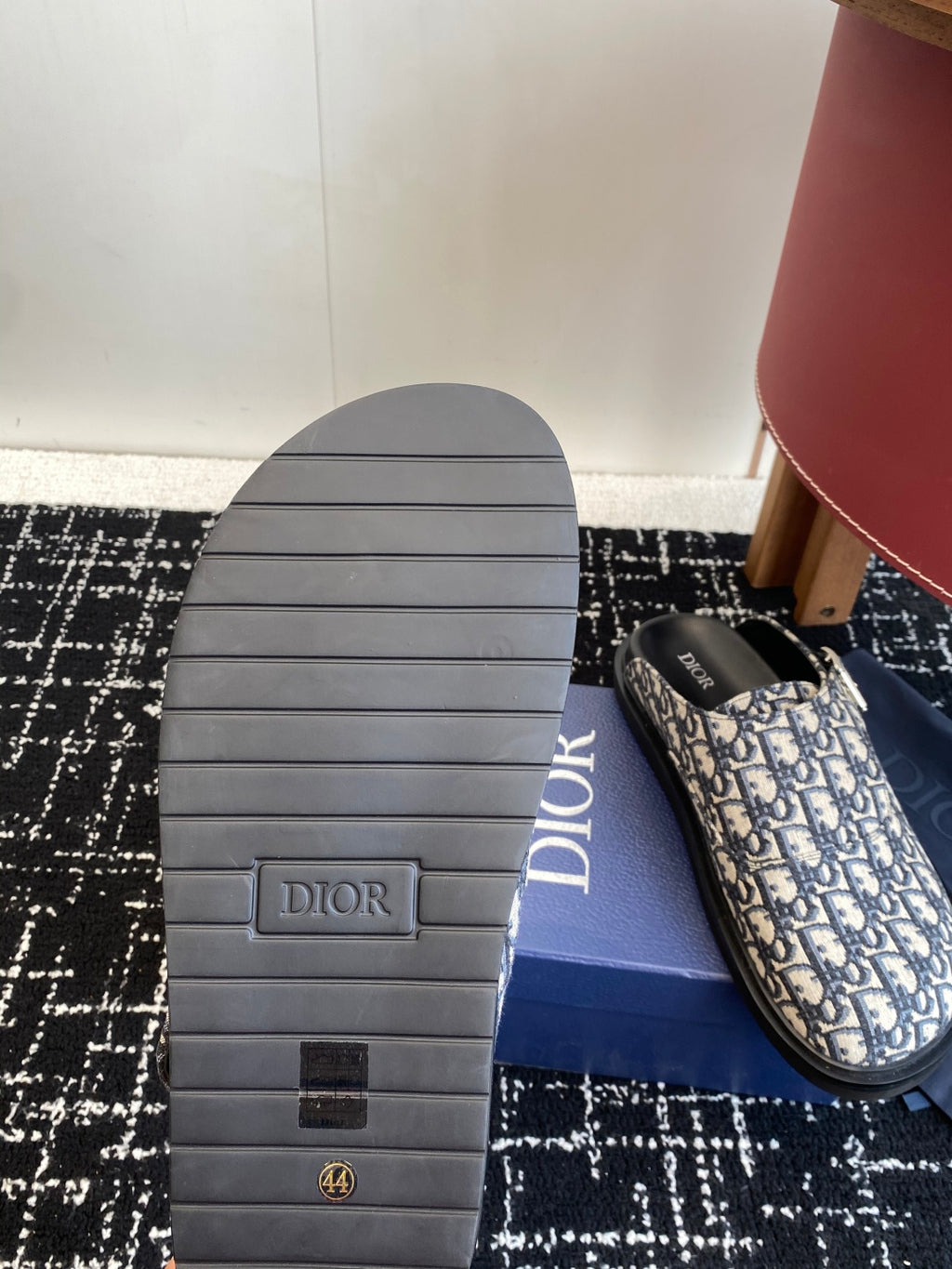 Dior sandals outsole with textured rubber tread and Dior logo mark