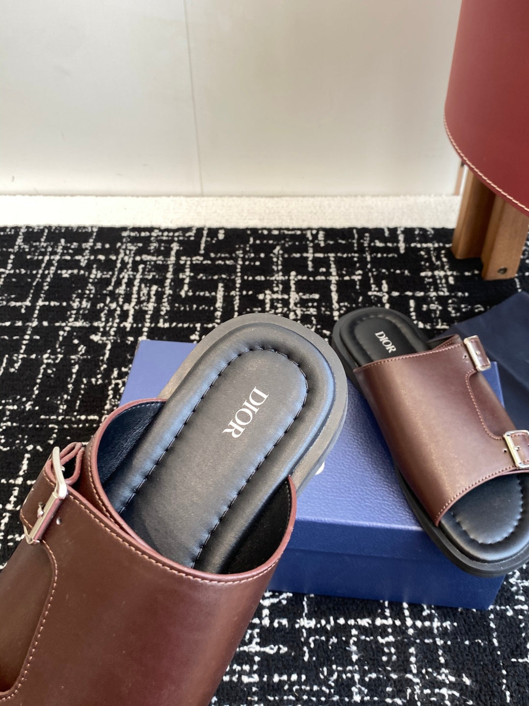 Dior slide sandals showing padded insole and taupe upper with buckle strap