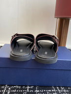 Dior sandals back view: two straps with buckles and gray cushioned footbed