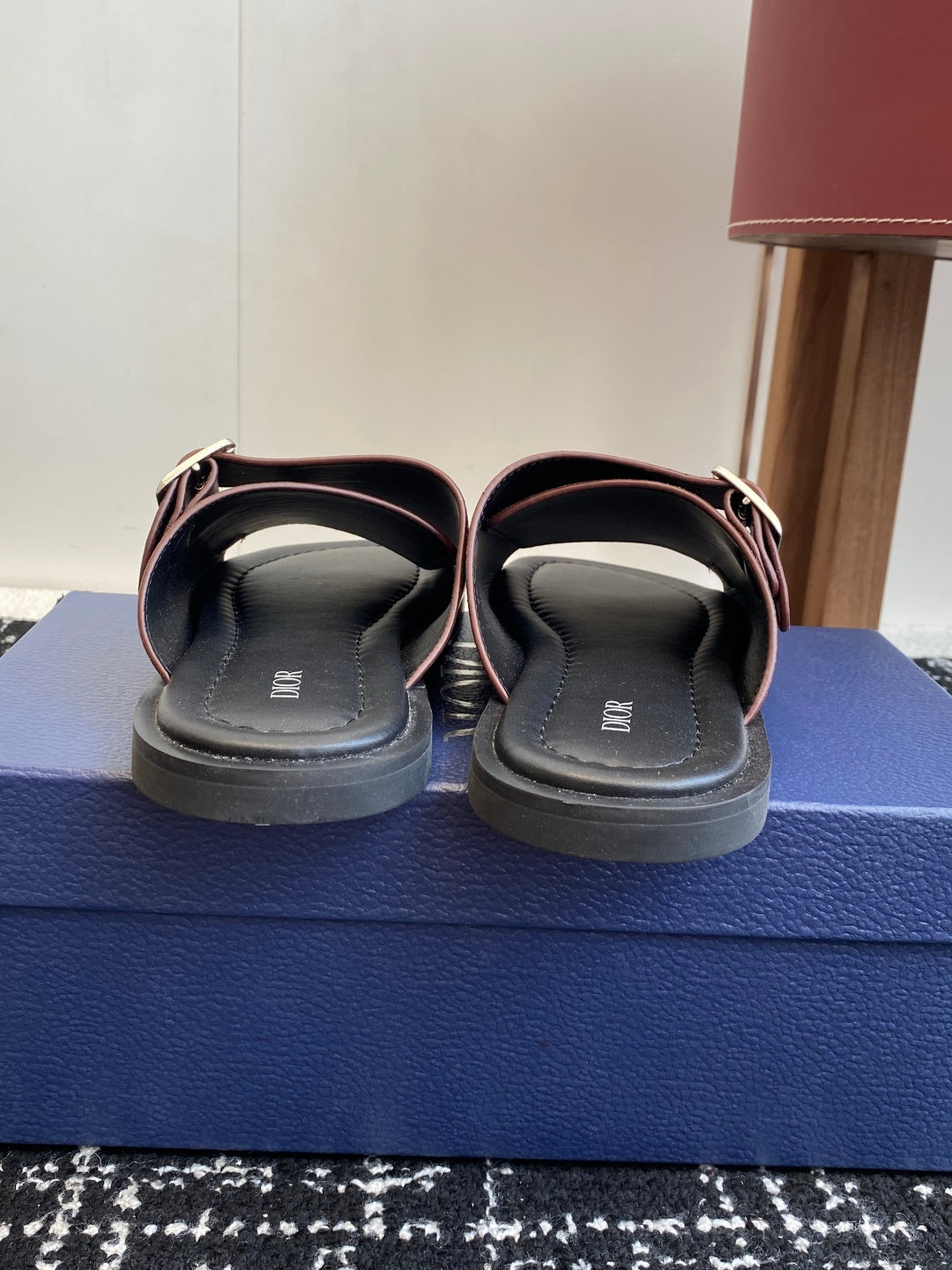 Dior sandals back view: two straps with buckles and gray cushioned footbed