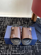 Dior slide sandals in taupe leather with two adjustable buckles and open toe