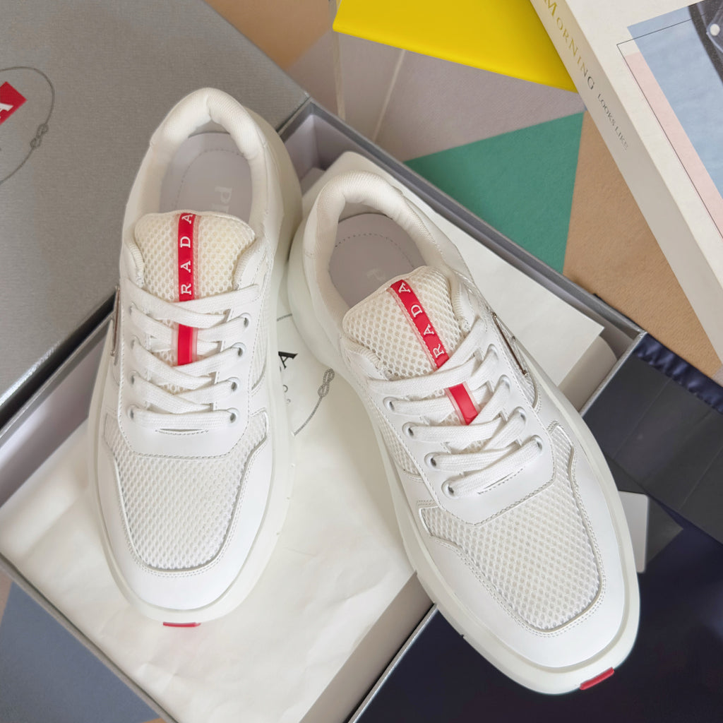 Prada unisex sneakers, white mesh upper with red logo stripe and lace-up front