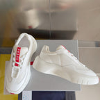 Prada white low-top sneakers with textured upper and padded collar