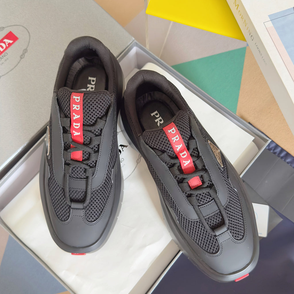 Prada unisex sneakers, dark gray mesh upper with red PRADA logo details