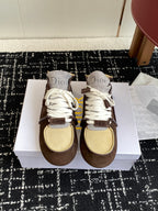 Dior unisex high-top sneakers with white laces, brown suede, and tan mesh panels