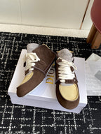 Dior unisex high-top sneakers, angled view, brown suede, white laces, and tan mesh trim