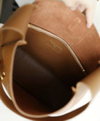 YSL brown leather bag interior with zip pocket and stitched lining