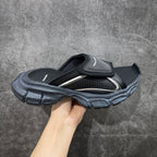 Balenciaga sandals in black and blue-gray with adjustable strap and perforated footbed