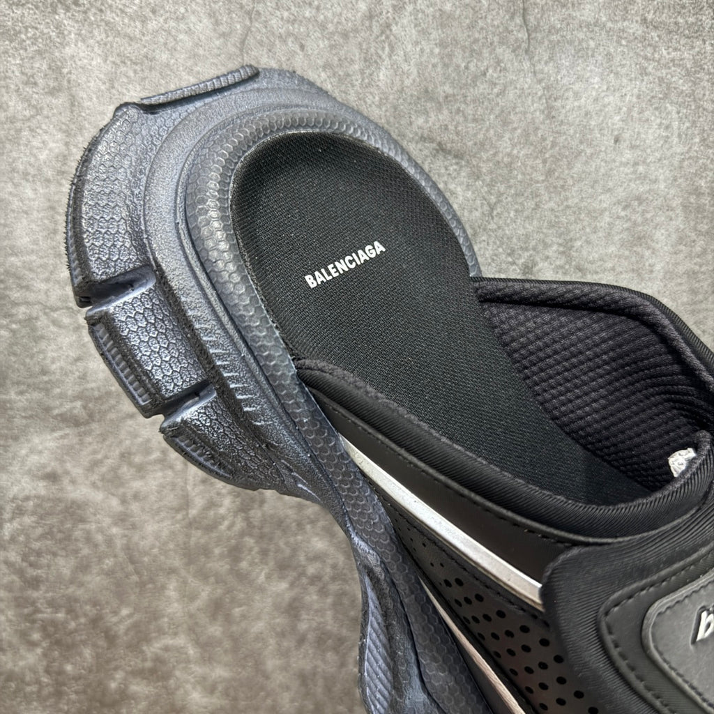 Balenciaga sandals close-up of footbed and side strap, textured gray upper