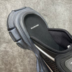 Balenciaga sandals close-up of footbed and side strap, textured gray upper
