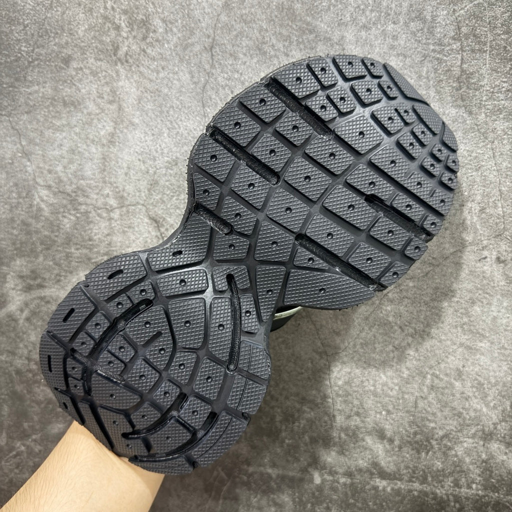 Balenciaga sandals outsole with dark tread pattern and circular traction grooves