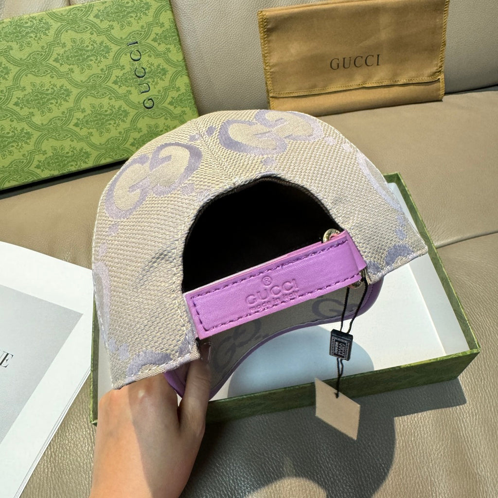 Gucci GG baseball cap interior view, black lining with purple strap detail.