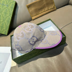 Gucci GG canvas baseball cap, light beige with purple-trim brim and side crown.