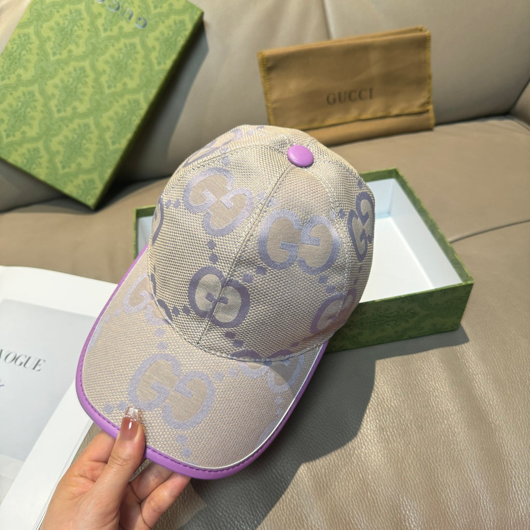 Gucci GG canvas baseball cap, light beige with purple brim edge and top button.