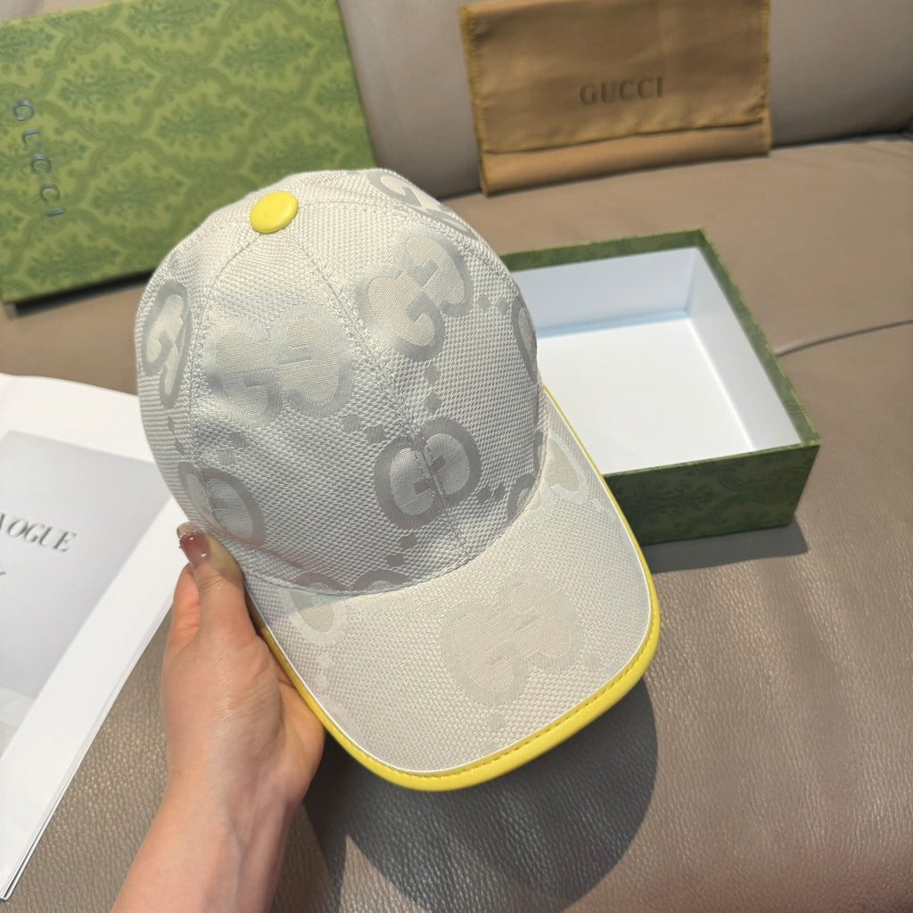 Gucci cap back view in white with GG pattern and yellow-edged brim