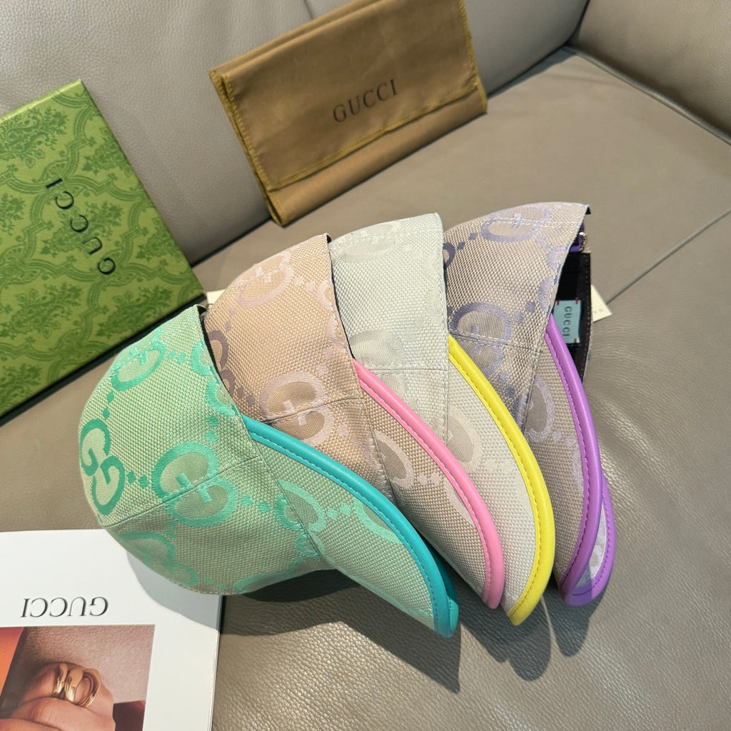 Gucci GG canvas cap set, light beige with purple plus teal and yellow accents.