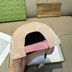 Beige Gucci GG baseball cap with pink inner band strap and curved brim