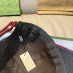 Black baseball cap interior with adjustable strap and attached Gucci label.