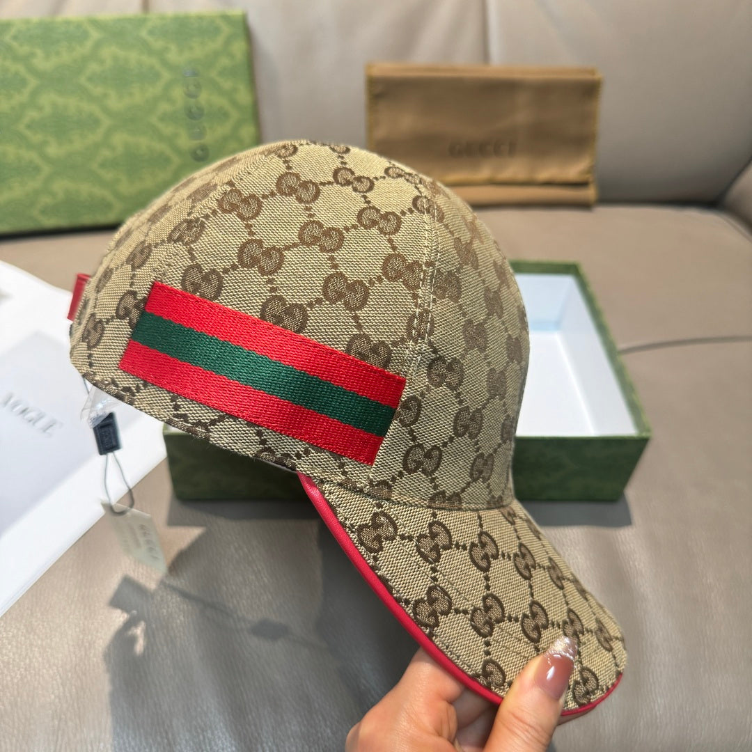 Gucci baseball cap in tan GG monogram with red and green web stripe detail