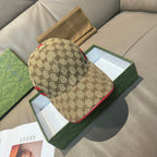 Gucci baseball cap in tan GG monogram with red-green web stripe and curved brim