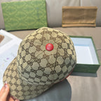 Gucci baseball cap in tan GG canvas with red button at crown