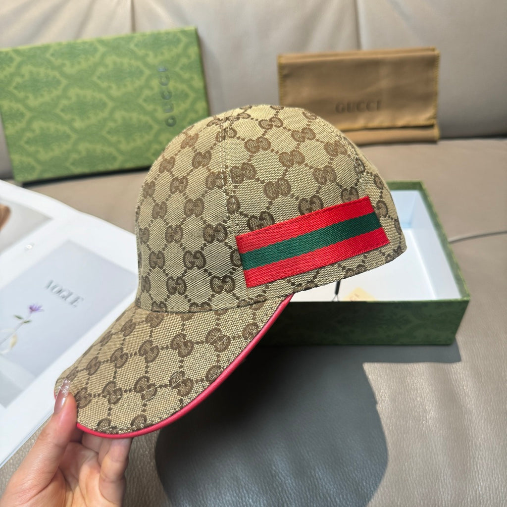 Gucci baseball cap in tan GG canvas with red and green web stripe and red underbrim
