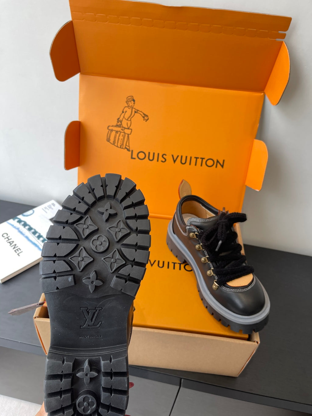 Louis Vuitton ladies sneakers: black outsole with Louis Vuitton monogram tread, lace-up upper