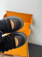 Louis Vuitton ladies sneakers: black upper with tan heel panel and fur trim