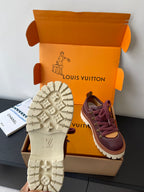 Louis Vuitton women's sneakers showing treaded outsole with stars and dark purple upper