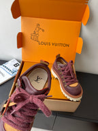 Louis Vuitton women's sneakers with dark purple uppers and purple laces; side monogram detail