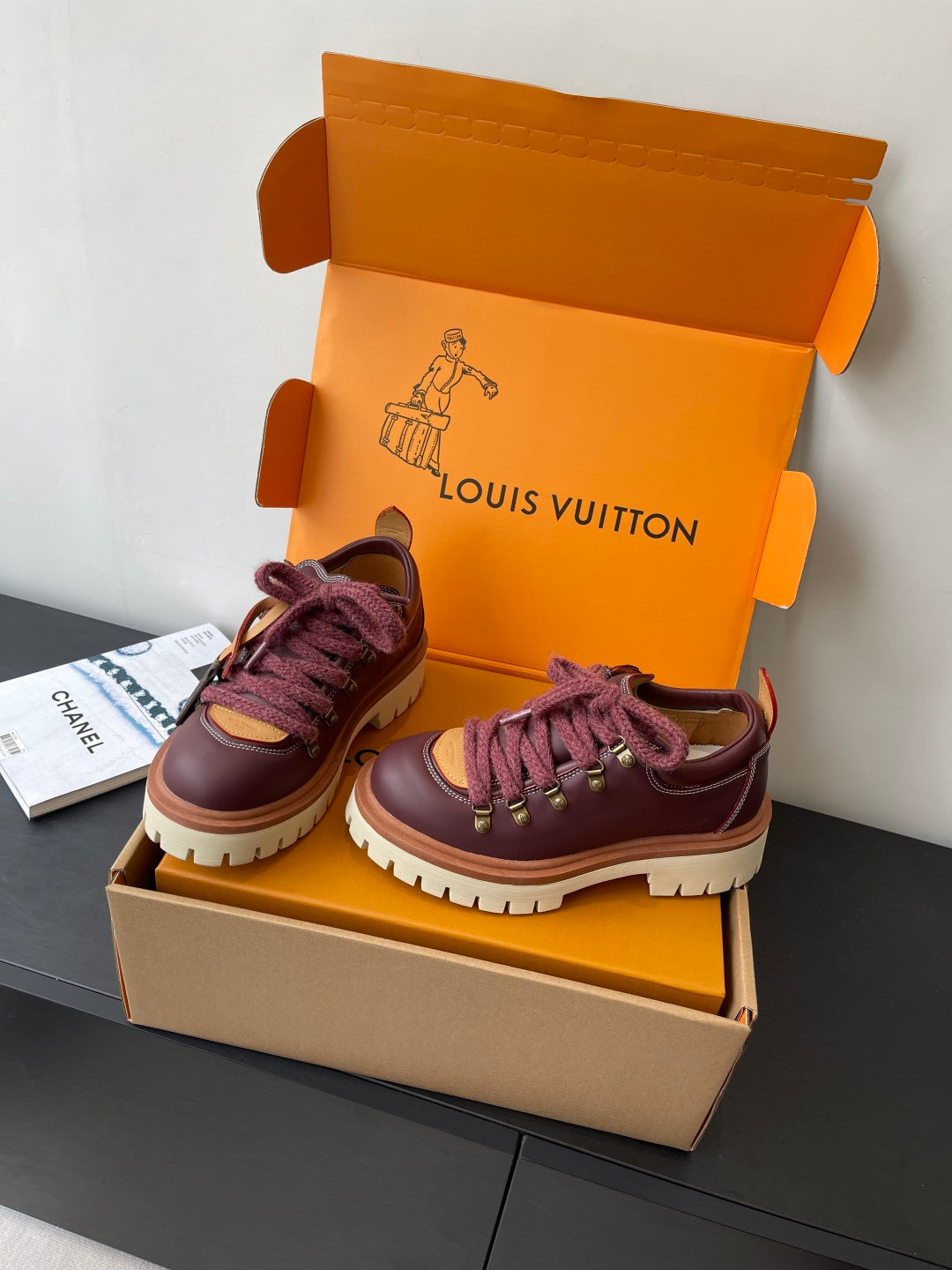 Louis Vuitton women's sneakers side-by-side, dark purple uppers with purple laces