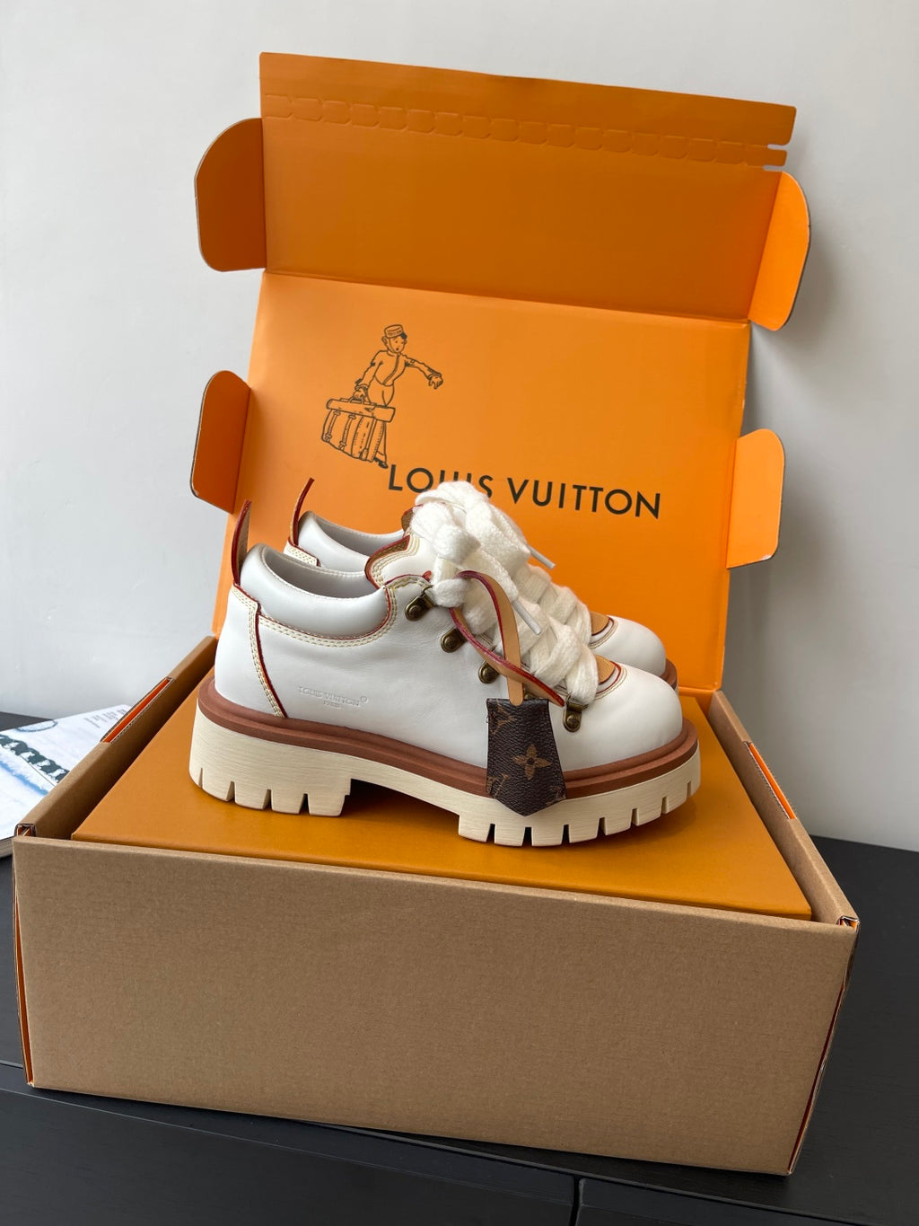 Louis Vuitton women's white sneakers in box, lace-up with brown-edged sole
