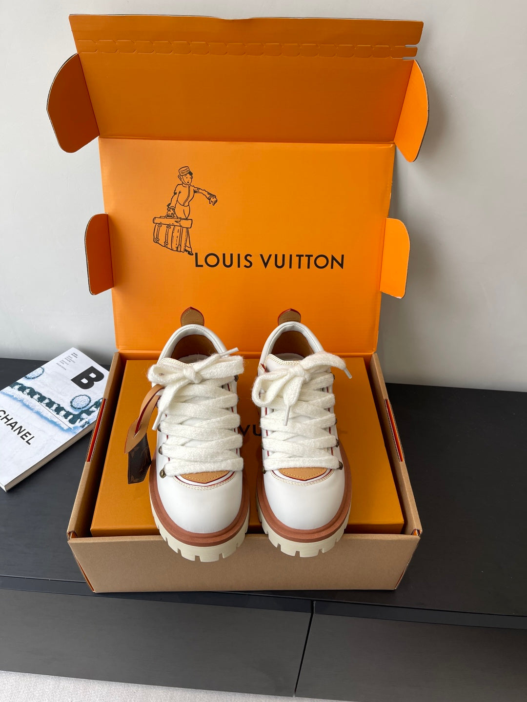 Louis Vuitton women's white lace-up sneakers with brown trim and thick rubber sole
