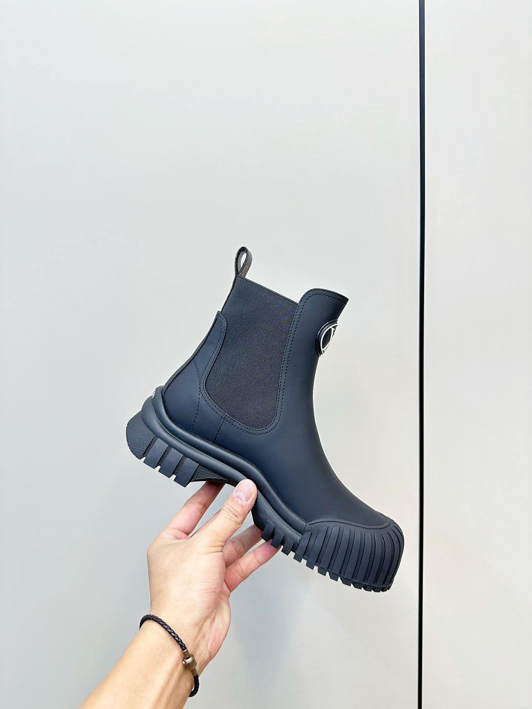 Dark navy Chelsea boot with elastic gore, pull tab, and ridged platform sole