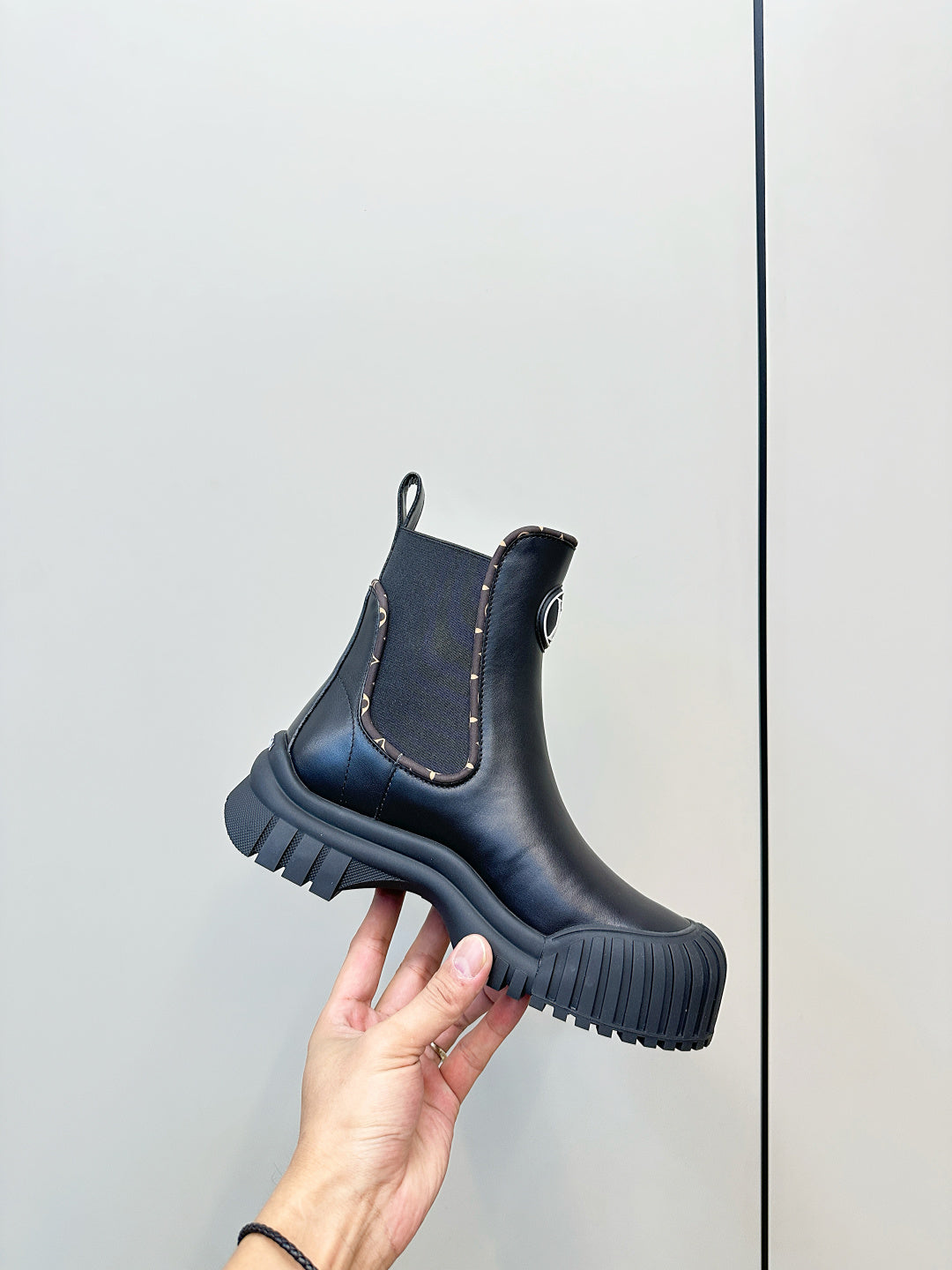 Louis Vuitton unisex Chelsea boot, dark leather, ridged rubber sole