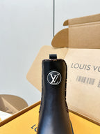 Louis Vuitton unisex Chelsea boot, dark leather with LV monogram heel pull tab