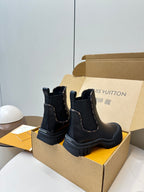 Louis Vuitton unisex Chelsea boots, dark navy leather, chunky tread soles