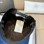 Prada cap interior view with dark lining and adjustable strap, tag attached.