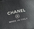 Chanel logo and "Made in Italy" stamped on black leather lining