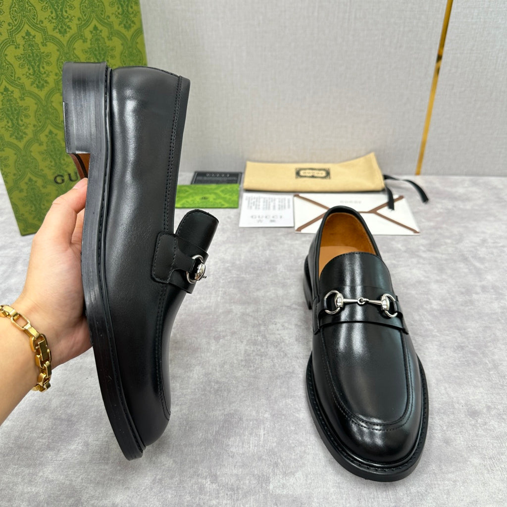 Gucci unisex loafers, black leather, low block heel, horsebit strap detail.