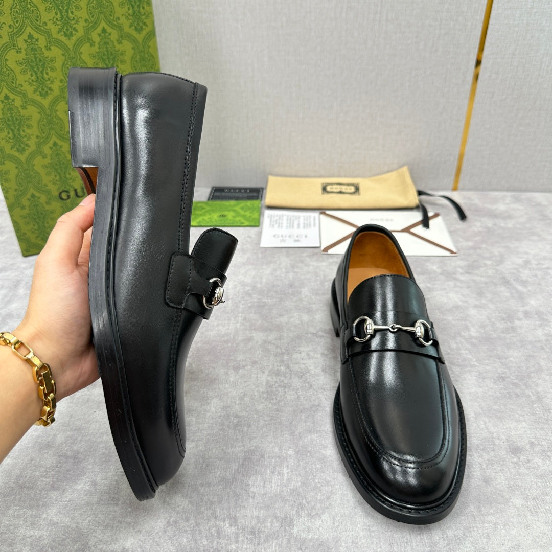 Gucci unisex loafers, black leather, low block heel, horsebit strap detail.