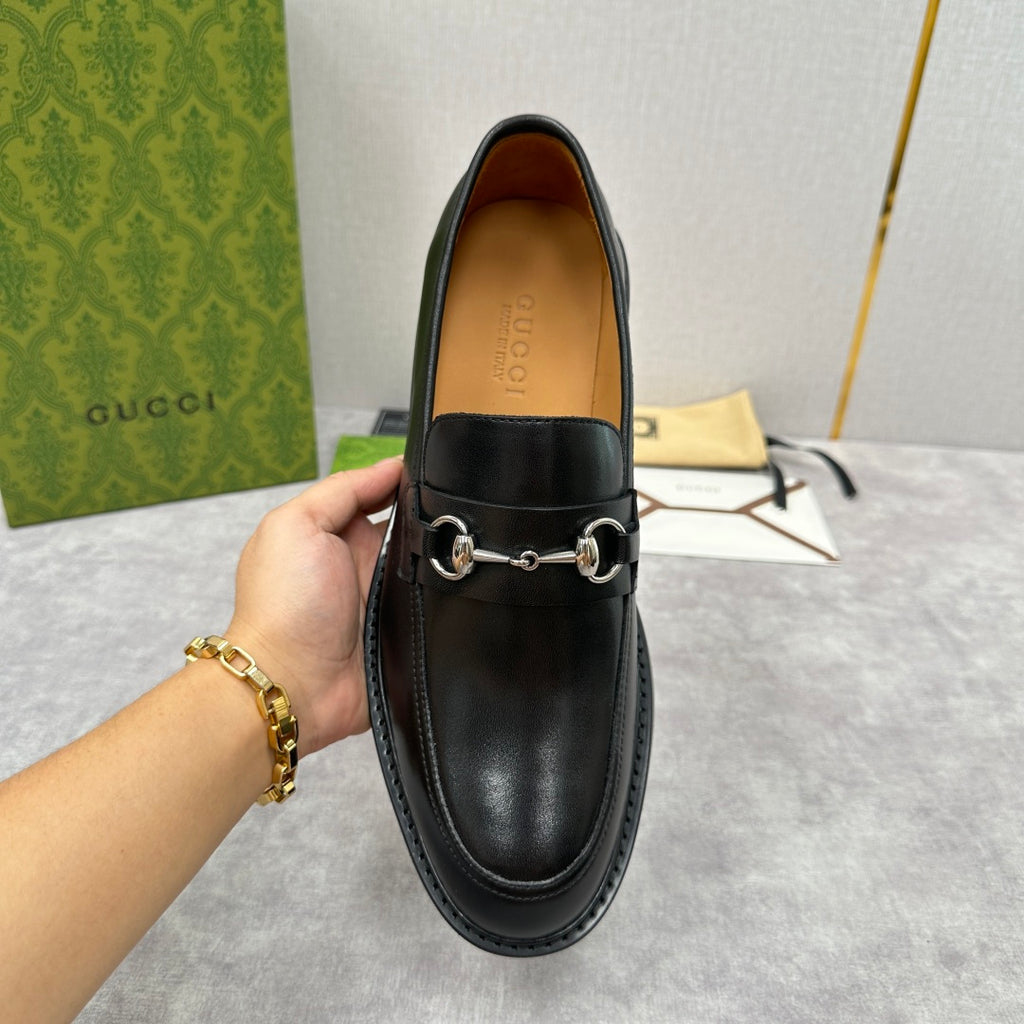 Gucci unisex leather loafer, black, horsebit strap and stitched toe seam.